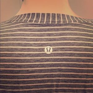 Grayish-Blue and white striped Lulu Lemon top.